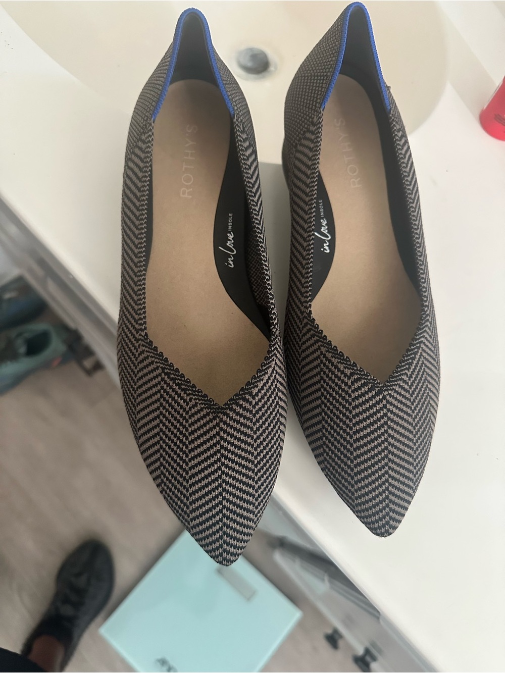 Rothy's Pointed Flats in Black and Cream Herringbone with Blue Trim